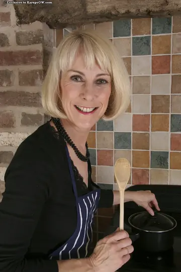 Thick Mature Blonde Spreads Her Hairy Pussy in the Kitchen