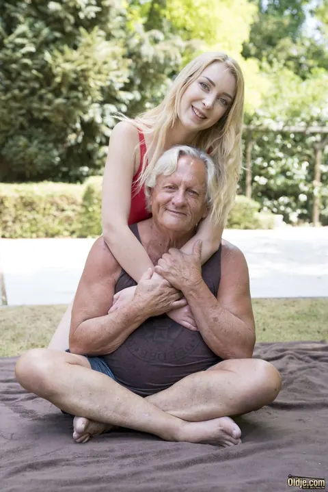 Amaris: Slim Blonde in a Bodysuit Rides Her Partner Outdoors – photo 1 of 21