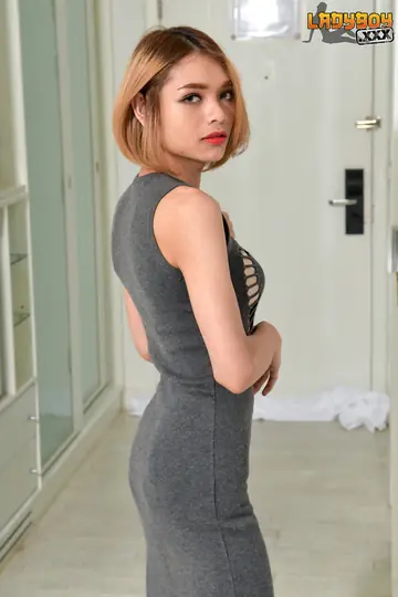 Asian Trans Woman Poses Nude Displaying Back Tattoo and Erection