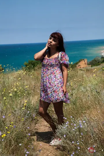 Mulatka – Petite Redhead Pulls Panties Aside and Spreads Her Pussy on the Beach