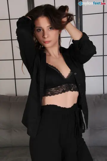 European Brunette Removes Her Heels in Sheer Pantyhose