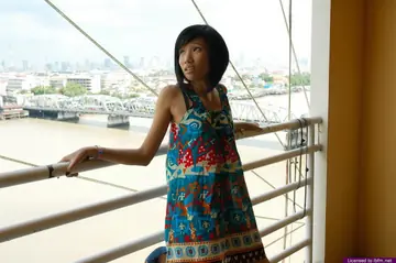 Slim Asian Brunette Spreads Her Hairy Pussy on the Balcony