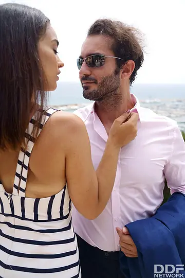 Brunette Gives a Blowjob Outdoors