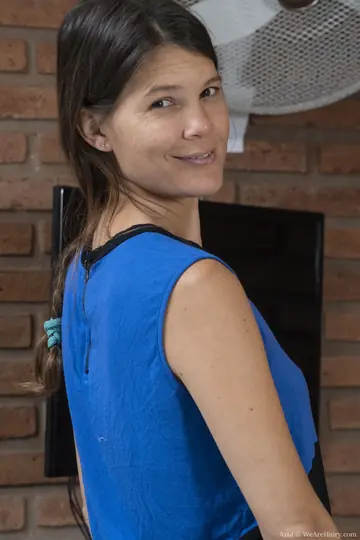 Tall Skinny Woman Spreads Her Hairy Pussy on a Wooden Table