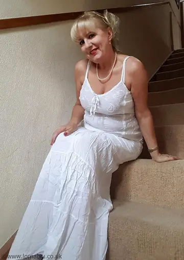 Lorna Blu – British Blonde MILF Flaunts White Lingerie and Stockings