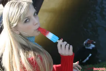 Jana Jordan – Skinny Blonde Flashes in a Short Skirt Outdoors