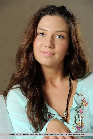 European Brunette Shows Her Ass and Spreads Her Shaved Pussy