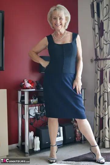 Michelle Nylons – Mature British Blonde Strips Off Her Dress and Fingers in Stockings