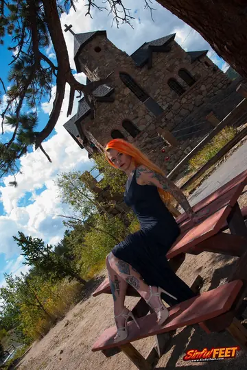 Quinn Carter – Redhead in a Skirt and Heels Exposes Her Feet Outdoors