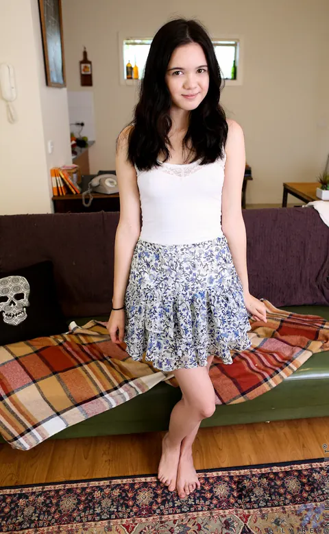 Lily Rei: Slim Brunette Lifts Her Skirt to Finger Her Hairy Pussy – photo 1 of 15
