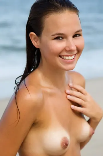 Petite European Strips Nude on the Beach