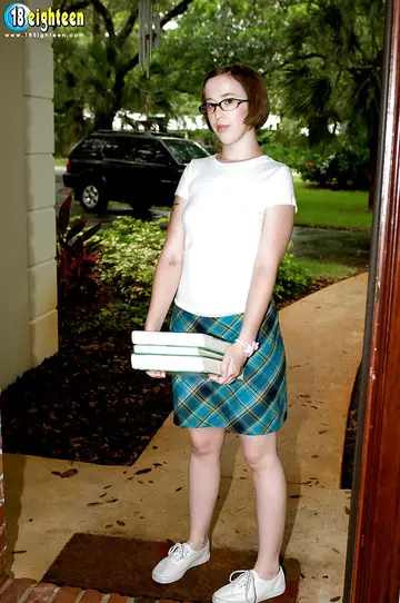 Short-Haired Redhead in Glasses and Skirt Spreads for Sex