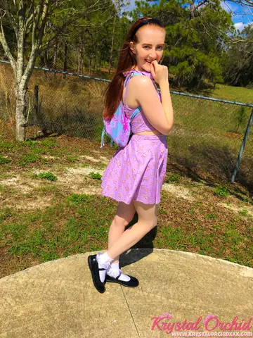 Petite Redhead Lifts Her Skirt and Toys Her Pussy Outdoors