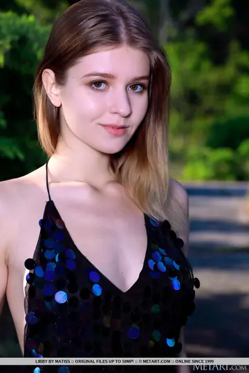 Woman Strips Out of Her Dress and Spreads on Driveway in Heels