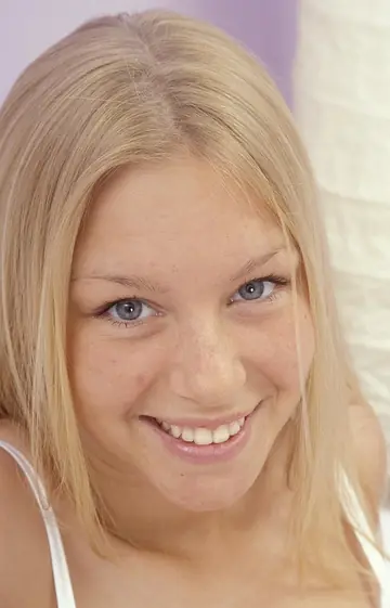Short-Haired Blonde Strips Nude and Spreads Her Trimmed Pussy
