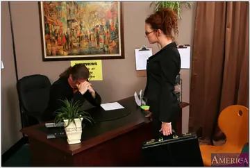 Audrey Hollander – Busty Redhead MILF Takes Anal and Swallows in the Office