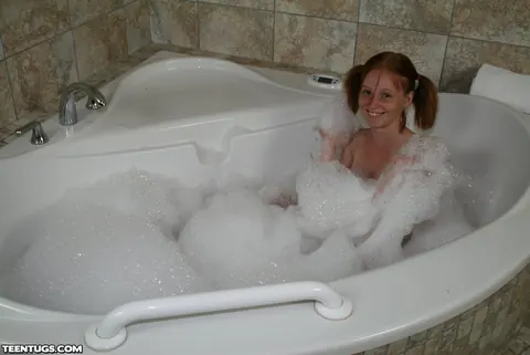 Alyssa Hart: Skinny Redhead Gives a Handjob and Kisses in the Bathroom – photo 1 of 12