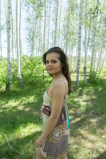 Skinny Woman Strips Out of Her Skirt and Heels Outdoors