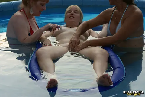 Trisha Swallows: Mature Lesbians with Natural Tits Use a Dildo by the Pool – photo 2 of 21