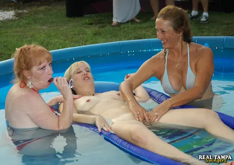 Trisha Swallows: Mature Lesbians with Natural Tits Use a Dildo by the Pool – photo 10 of 21