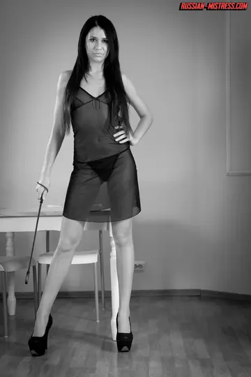 Brunette in High Heels Dominates Male Slave with Piss in the Bathroom