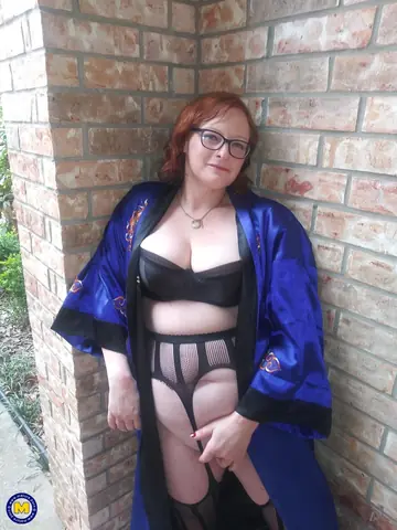 Curvy Redhead MILF in Glasses Fingers and Dildos Her Pussy on a Chair