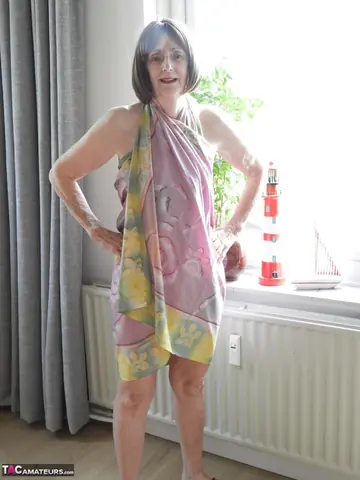 Kat Kitty – Brunette with Short Hair Removes Her Bikini and Skirt to Spread Her Pussy