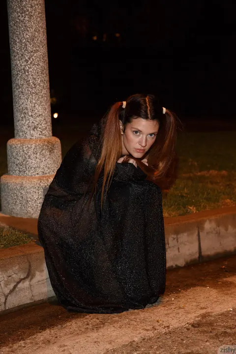 Woman in a Costume Spreads Her Legs Outdoors – photo 11 of 12