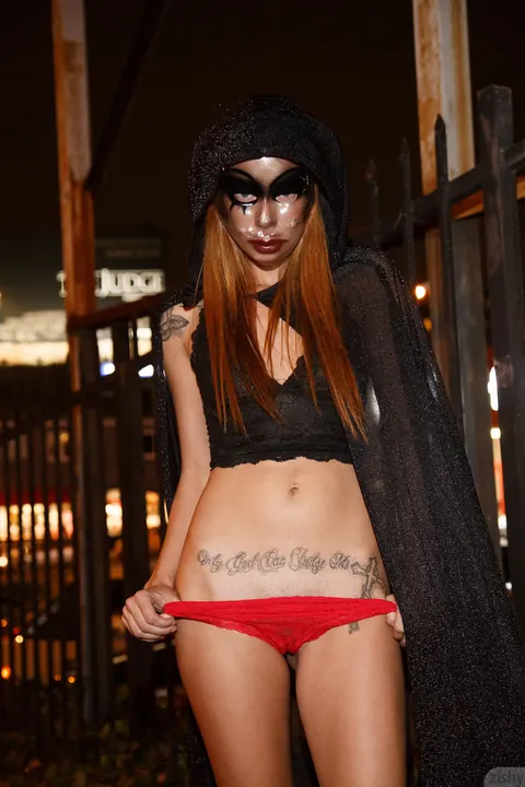 Woman in a Costume Spreads Her Legs Outdoors – photo 9 of 12
