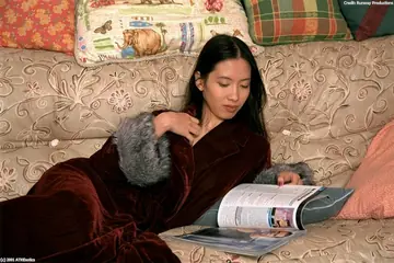 Slim Asian Woman Bares Her Hairy Bush and Fingers Her Pussy