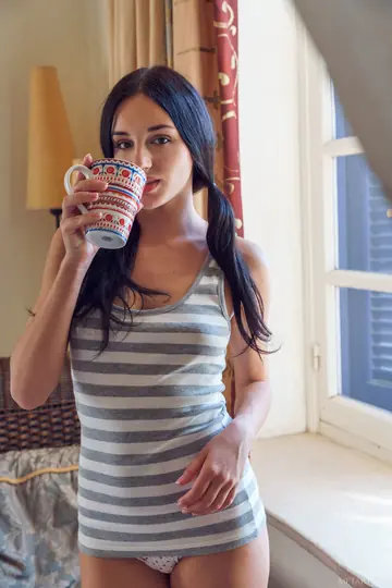 Sultana – Brunette in Knee Socks Spreads Her Pussy