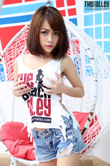 Asian Woman with Short Hair Shows Her Big Tits and Spreads Her Trimmed Pussy