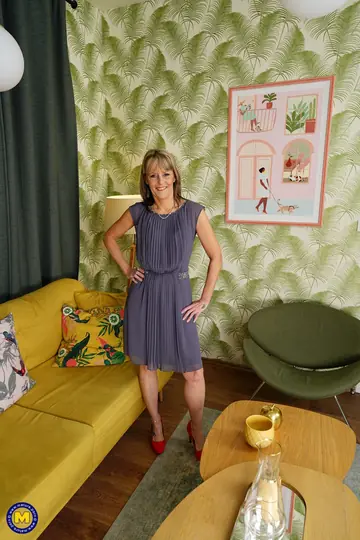 European MILF in a Summer Dress Poses and Shows Off Her Figure
