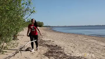 Thick European Brunette Pulls Down Her Yoga Pants and Spreads on the Beach