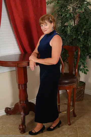 Curvy Redhead MILF Peels Off Her Stockings and Spreads Her Pussy