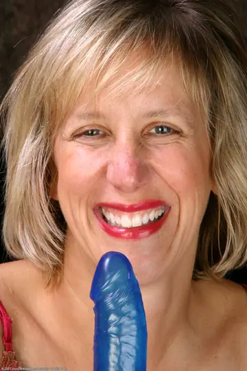 Short-Haired Woman with Big Tits Spreads Her Pussy