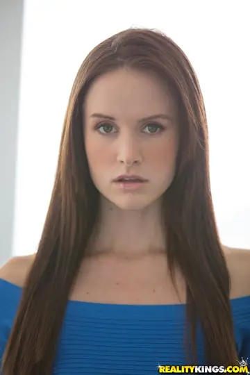 Brunette with Small Enhanced Tits Lifts Her Skirt and Spreads