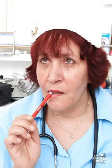 Curvy MILF in a Nurse Uniform and Stockings Spreads Her Hairy Pussy