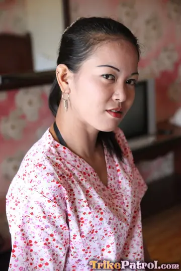 Asian Woman Spreads Her Trimmed Pussy on the Bed