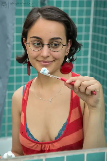 Asian Babe with Hairy Pussy Fingers Herself in the Shower