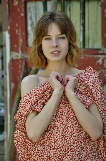 Slim Hairy Brunette with Small Natural Tits Undresses Outdoors
