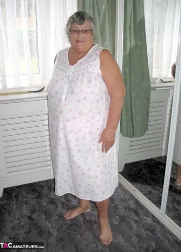 European BBW Strips on the Bed and Grabs Her Belly Roll