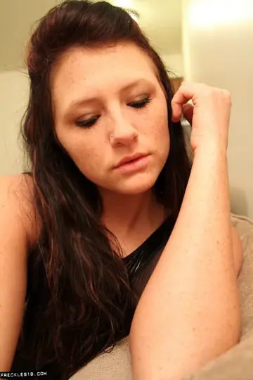 Brunette in Leather Lingerie Takes Selfies While Fingering Herself