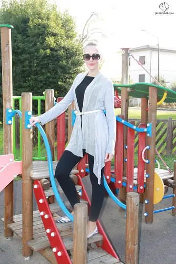 Woman in Glasses Poses Outdoors
