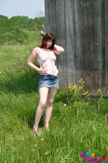 B4rbi3 – Brunette Reveals Her Big Natural Tits in a Denim Skirt Outdoors