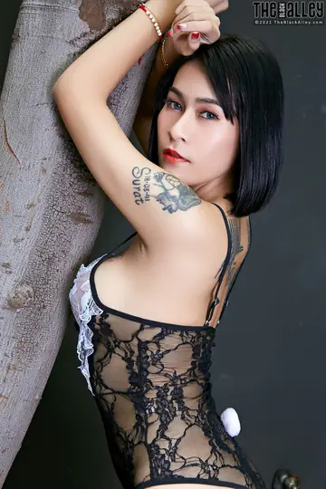 Mintra – Asian Babe in Lingerie and Stockings Spreads Her Hairy Pussy