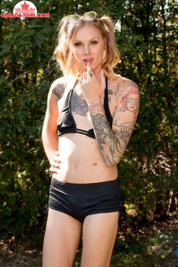 Tattooed Trans Woman Stands Nude Outdoors and Strokes Her Cock