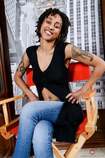 Petite Ebony Babe Strips Out of Her Jeans and Spreads Her Hairy Pussy