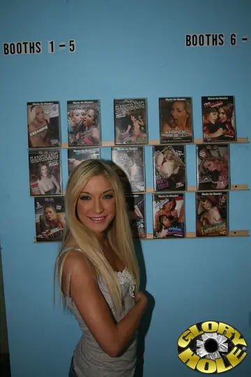 Amy Brooke – Skinny Blonde in Boots Sucks BBC and Takes a Cumshot at the Gloryhole