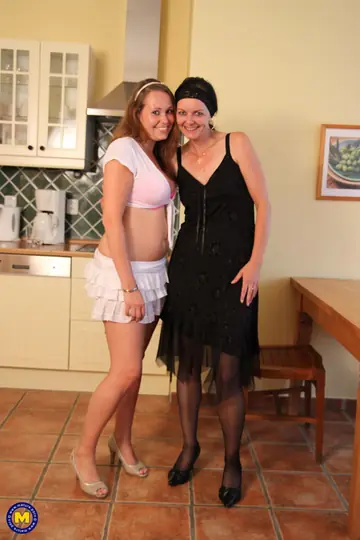 Tanned European MILFs Strip and Have Lesbian Sex